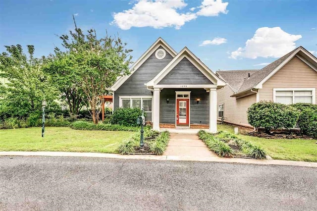 view of front of home with a front lawn