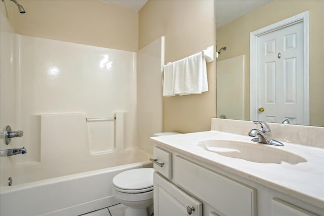 bathroom featuring tile patterned floors, vanity, toilet, and shower / bathtub combination