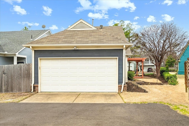 garage featuring fence