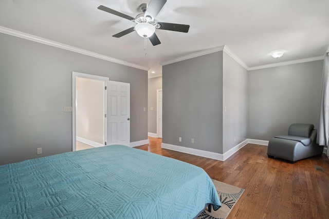 bedroom with ornamental molding, wood finished floors, a ceiling fan, and baseboards