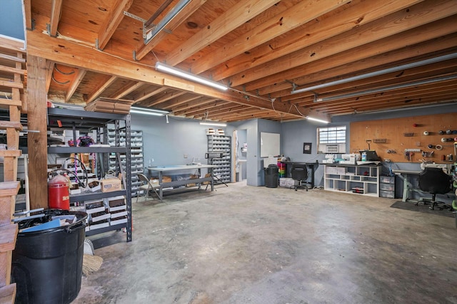 basement with a workshop area