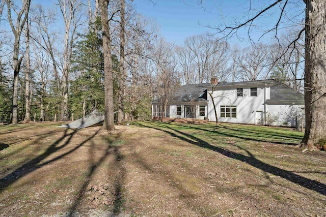 exterior space featuring dirt driveway