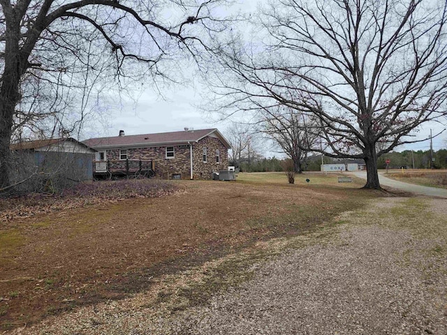 view of yard featuring a deck