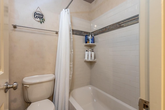 full bathroom featuring shower / bath combo and toilet