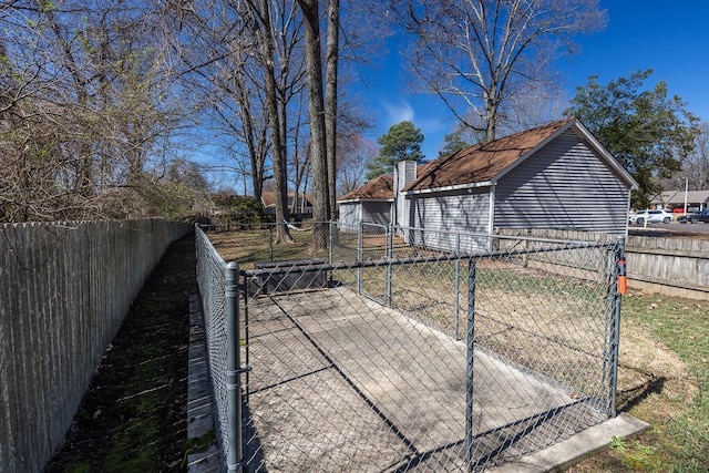 view of yard with a gate and fence