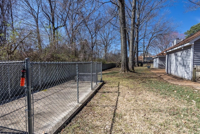 view of yard with a gate and fence