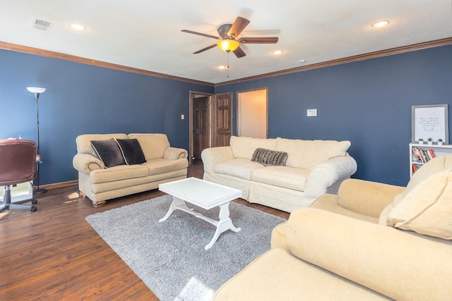 living area featuring recessed lighting, visible vents, crown molding, and wood finished floors