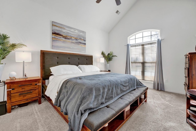 bedroom with high vaulted ceiling, visible vents, ceiling fan, and carpet flooring