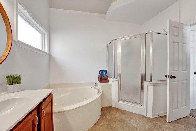 full bath with a stall shower, vanity, a tub with jets, and tile patterned floors