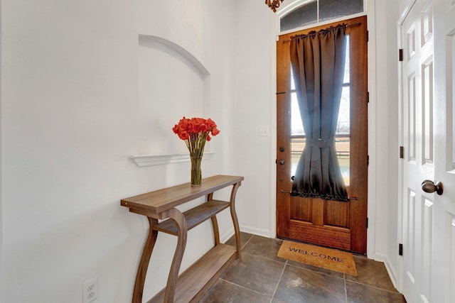 entrance foyer featuring baseboards