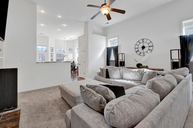 living area featuring dark colored carpet, recessed lighting, a ceiling fan, and baseboards