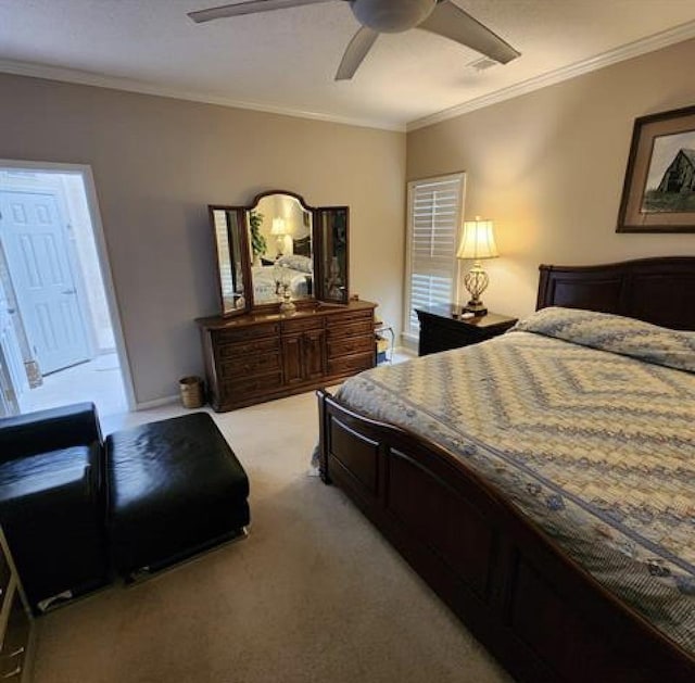 bedroom featuring a ceiling fan, light carpet, and crown molding