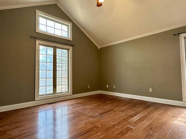 bonus room with lofted ceiling, visible vents, ceiling fan, and wood finished floors