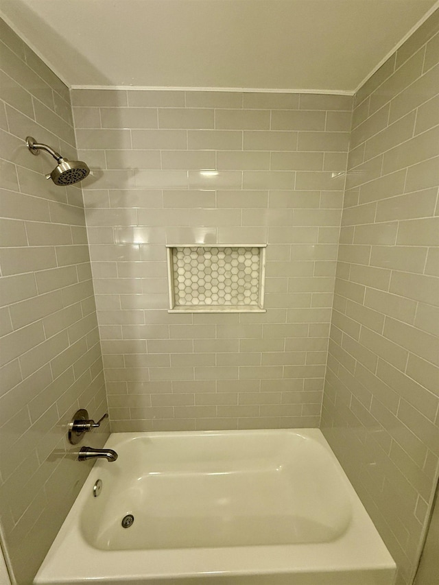 bathroom with washtub / shower combination