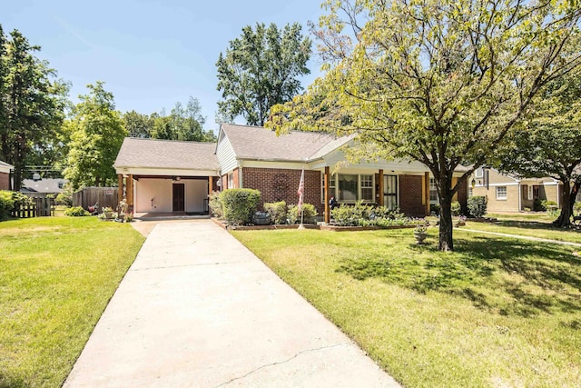 single story home featuring a front yard, brick siding, driveway, and fence