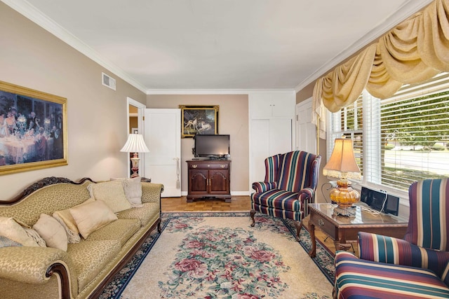 living room with visible vents and crown molding