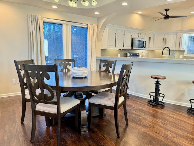 dining area with ceiling fan, baseboards, dark wood-style flooring, and recessed lighting