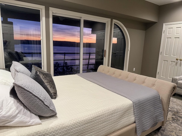 carpeted bedroom featuring access to outside