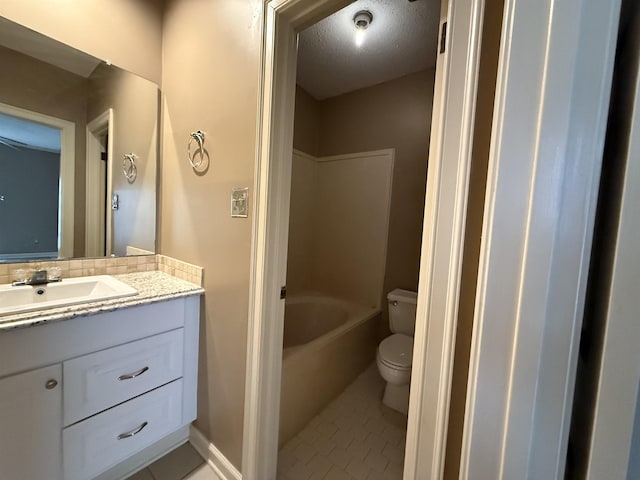 bathroom with shower / bath combination, toilet, tile patterned floors, a textured ceiling, and vanity