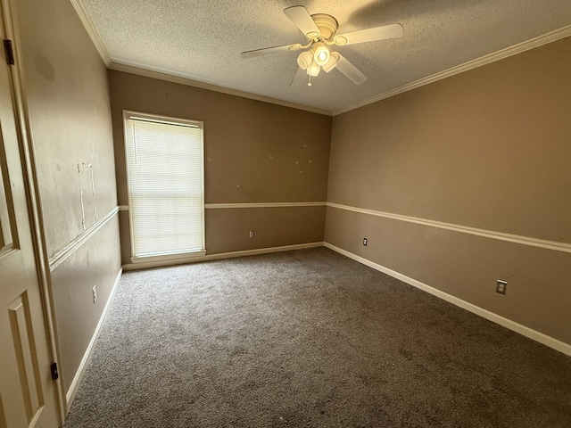 empty room with carpet floors, a ceiling fan, ornamental molding, and a textured ceiling