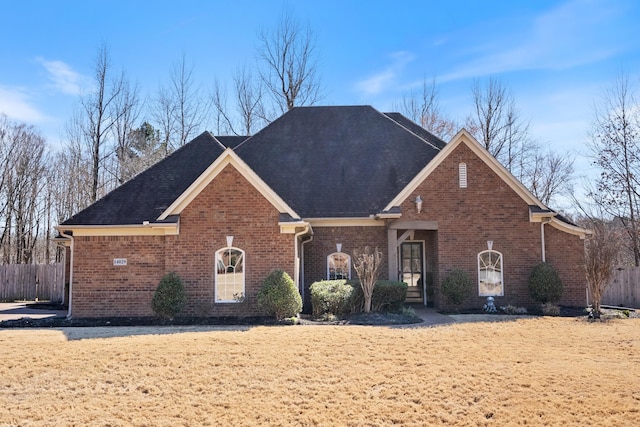 14029 Knightsbridge Ln, Olive Branch, MS 38654 - view of front of property featuring fence and brick siding