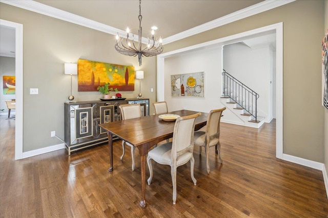 dining area with stairs, ornamental molding, wood finished floors, and baseboards