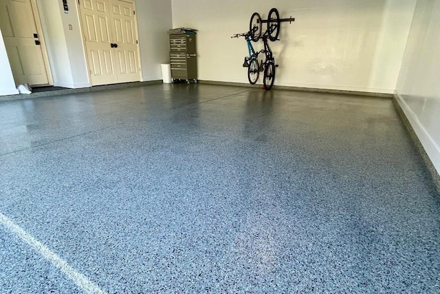 garage featuring baseboards