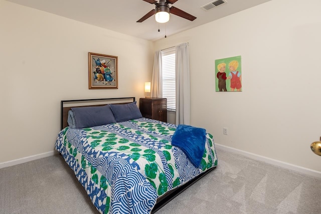 bedroom with baseboards, visible vents, ceiling fan, and carpet flooring