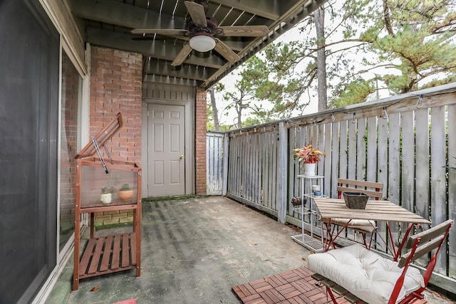 view of patio / terrace featuring a ceiling fan and fence