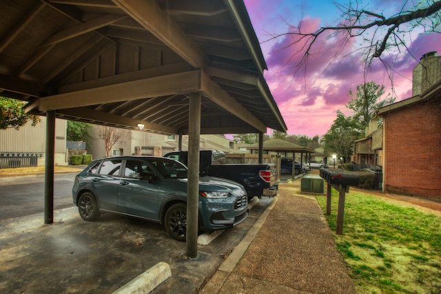 view of parking at dusk