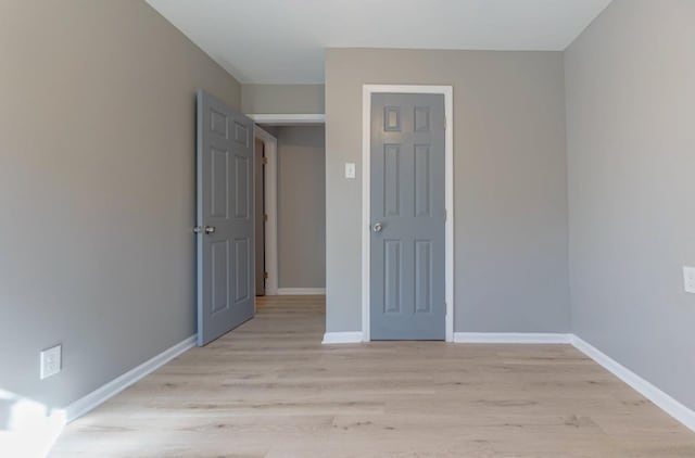 750 Chelsea Dr, Memphis, TN 38107 - unfurnished bedroom featuring light wood finished floors and baseboards