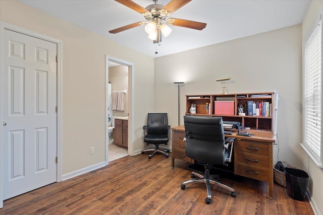 office with ceiling fan, baseboards, and wood finished floors