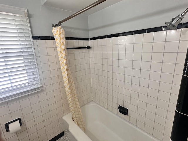 4986 Verosa Ave, Memphis, TN 38117 - bathroom featuring shower / tub combo with curtain
