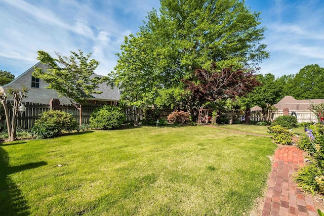 view of yard with fence