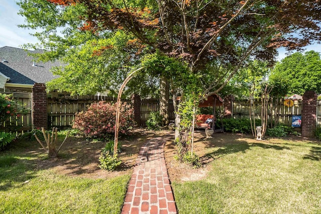 view of yard with fence