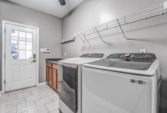 clothes washing area with laundry area, light tile patterned floors, a ceiling fan, and washer and clothes dryer