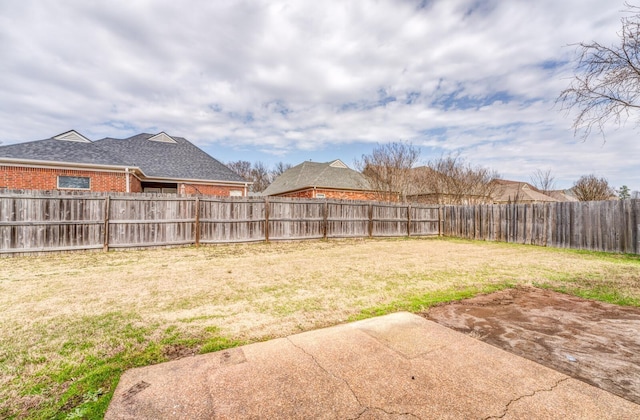 view of yard featuring a fenced backyard