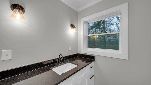 bathroom featuring vanity and crown molding