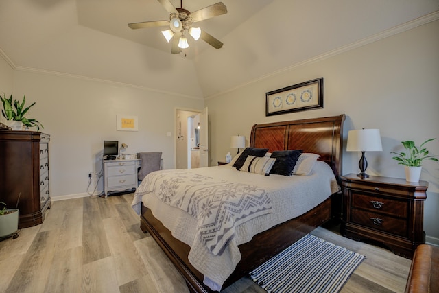 bedroom featuring light wood-style flooring, crown molding, baseboards, and vaulted ceiling