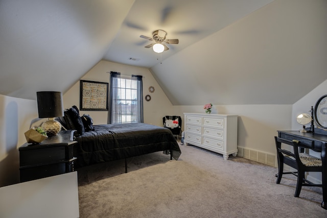 bedroom with visible vents, light carpet, lofted ceiling, and ceiling fan