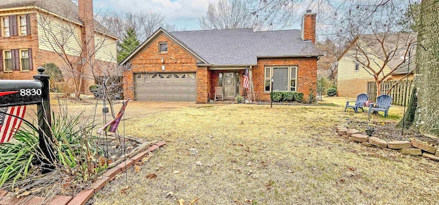 view of front of house with driveway, roof with shingles, a garage, brick siding, and a chimney