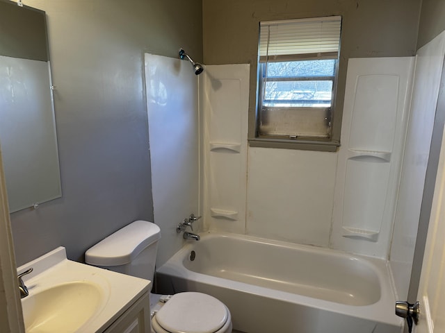 full bath featuring toilet, shower / washtub combination, and vanity