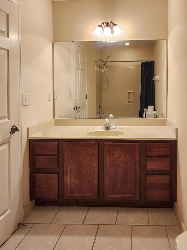 bathroom featuring tile patterned floors and vanity