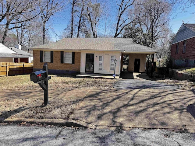 3558 Kensett Dr, Memphis, TN 38127 - view of front of home featuring fence, brick siding, and crawl space
