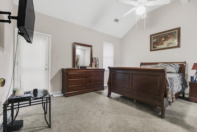 bedroom with a ceiling fan, baseboards, visible vents, vaulted ceiling, and light carpet