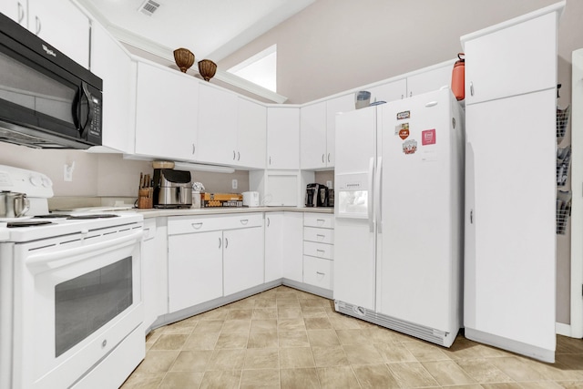 kitchen featuring visible vents, white appliances, white cabinetry, and light countertops