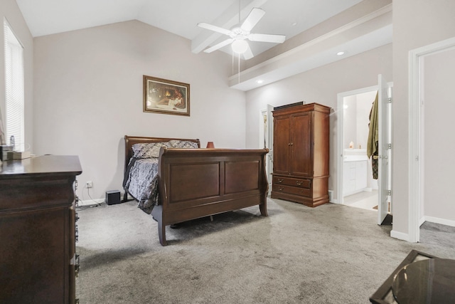 bedroom featuring ceiling fan, baseboards, light colored carpet, vaulted ceiling, and ensuite bathroom