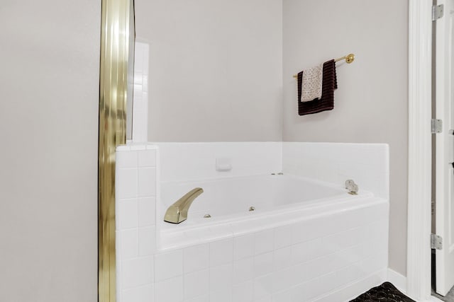 bathroom with a garden tub