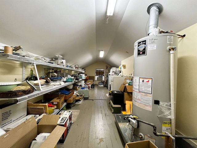 interior space featuring gas water heater and washer / dryer