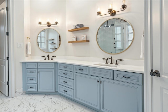 full bath with double vanity, marble finish floor, a shower, and a sink